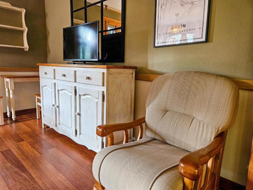TV a/nebo společenská místnost v ubytování Apartamentos Casa Boira 3000