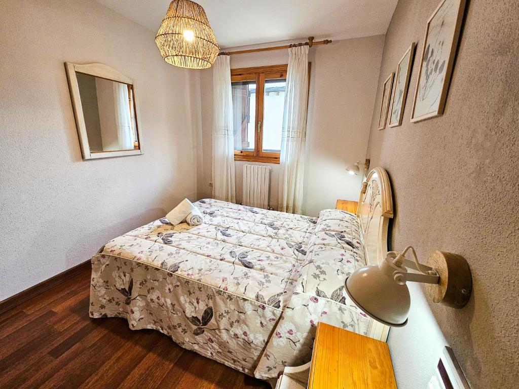 Postel nebo postele na pokoji v ubytování Apartamentos Casa Boira 3000