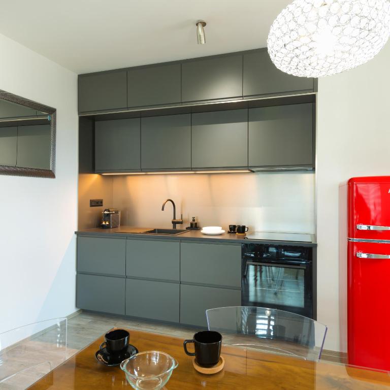Kuchyň nebo kuchyňský kout v ubytování AIMÉE by HOME - boutique apartmán