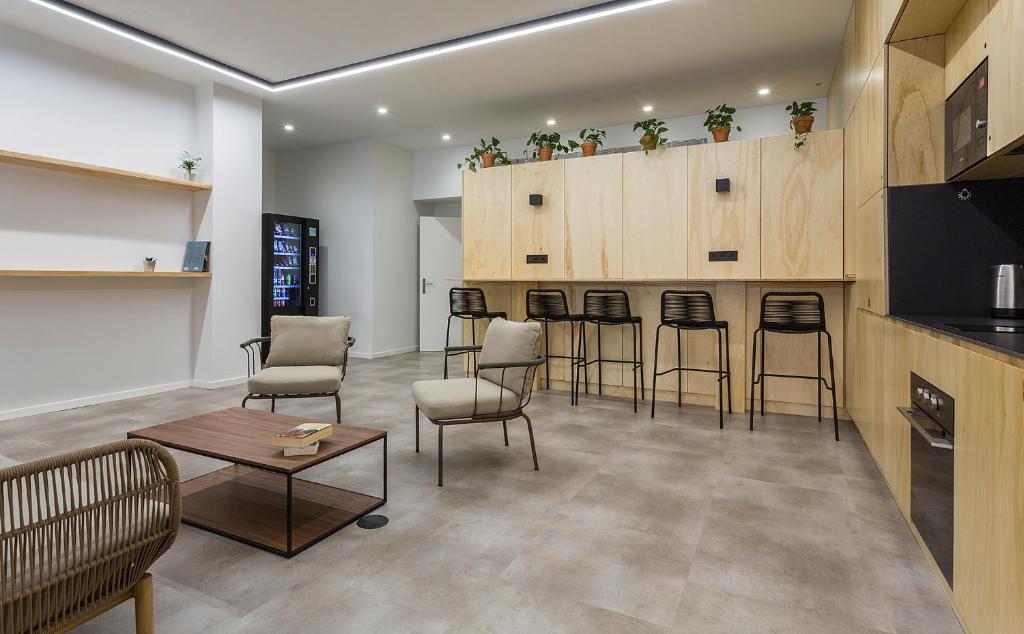 Kuchyň nebo kuchyňský kout v ubytování Urban Cube Hostel Sevilla