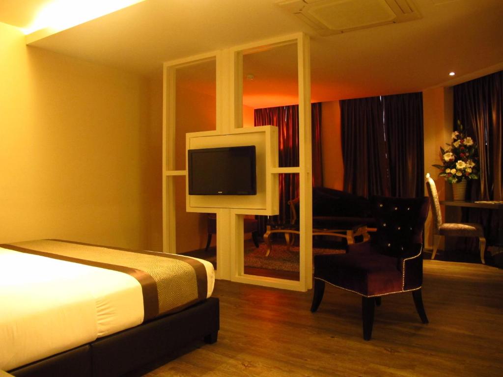 TV a/nebo společenská místnost v ubytování Hotel Austin Paradise