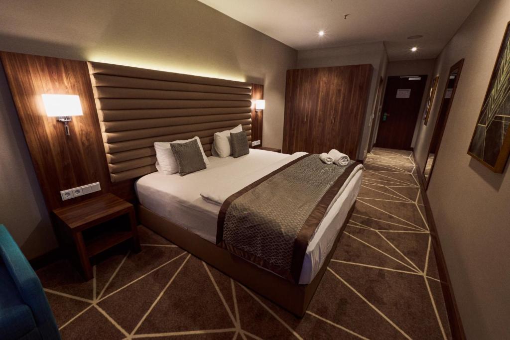 Postel nebo postele na pokoji v ubytování Puzzle Hotel Airport Frankfurt