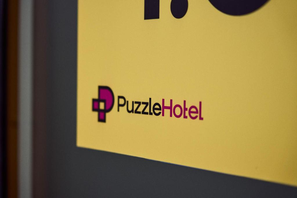 Certifikát, hodnocení, plakát nebo jiný dokument vystavený v ubytování Puzzle Hotel Airport Frankfurt