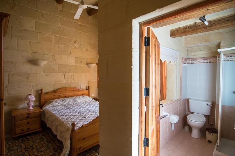 Ένα ή περισσότερα κρεβάτια σε δωμάτιο στο 4 Bedroom Farmhouse with Private Pool