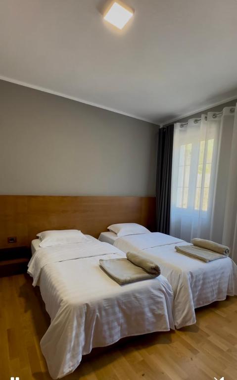 Postel nebo postele na pokoji v ubytování Hotel Rubin