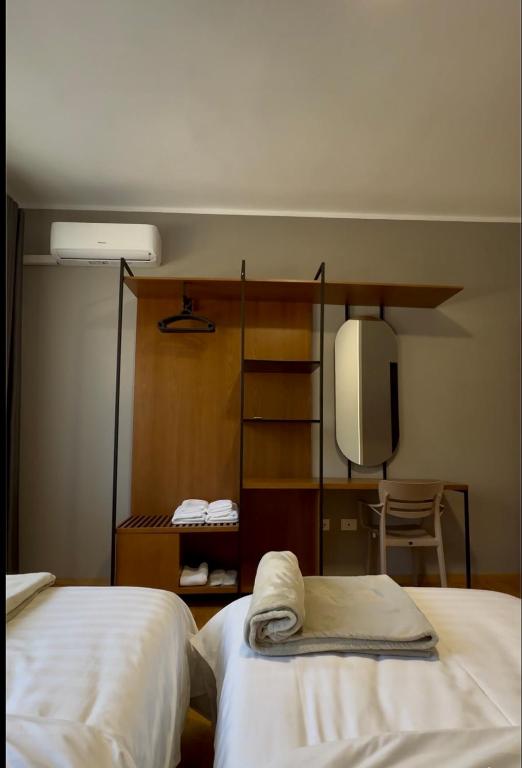 Postel nebo postele na pokoji v ubytování Hotel Rubin