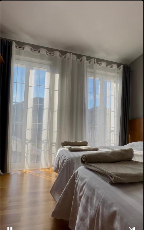Postel nebo postele na pokoji v ubytování Hotel Rubin