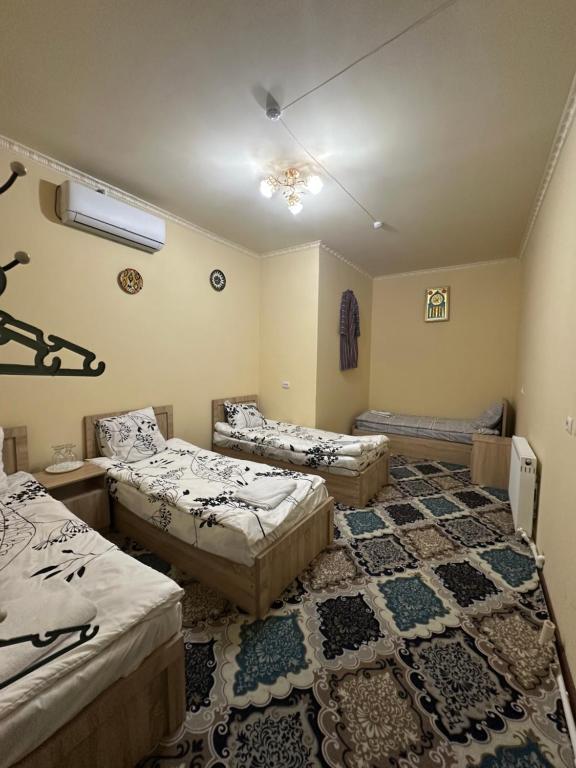 Katil atau katil-katil dalam bilik di ZARIN Guest house