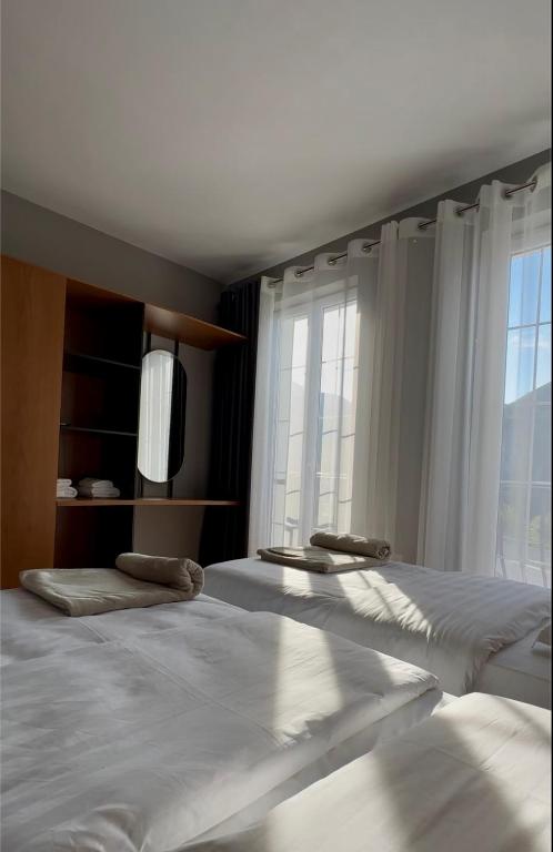 Postel nebo postele na pokoji v ubytování Hotel Rubin