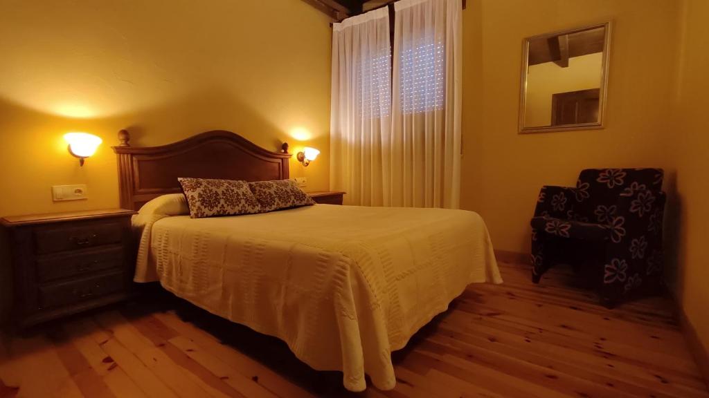 Posteľ alebo postele v izbe v ubytovaní Casa Rural La Tina