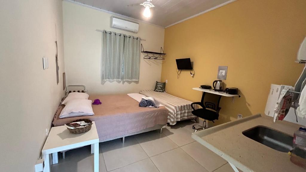 Ένα ή περισσότερα κρεβάτια σε δωμάτιο στο Portal Mágico