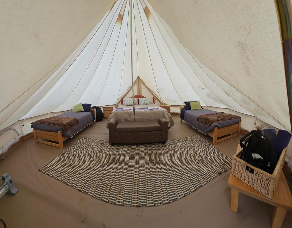 Posezení v ubytování Praderas Los Peumos Glamping-Cabañas
