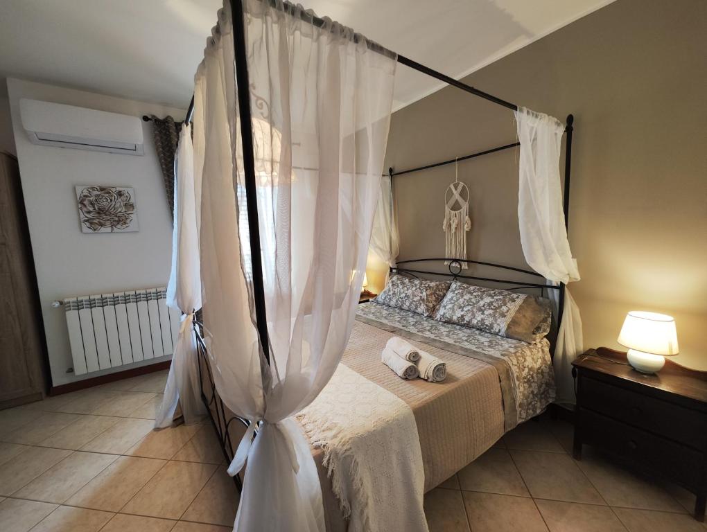 Postel nebo postele na pokoji v ubytování Casa Carini - Villa Vacanze sul Mare con piscina idromassaggio