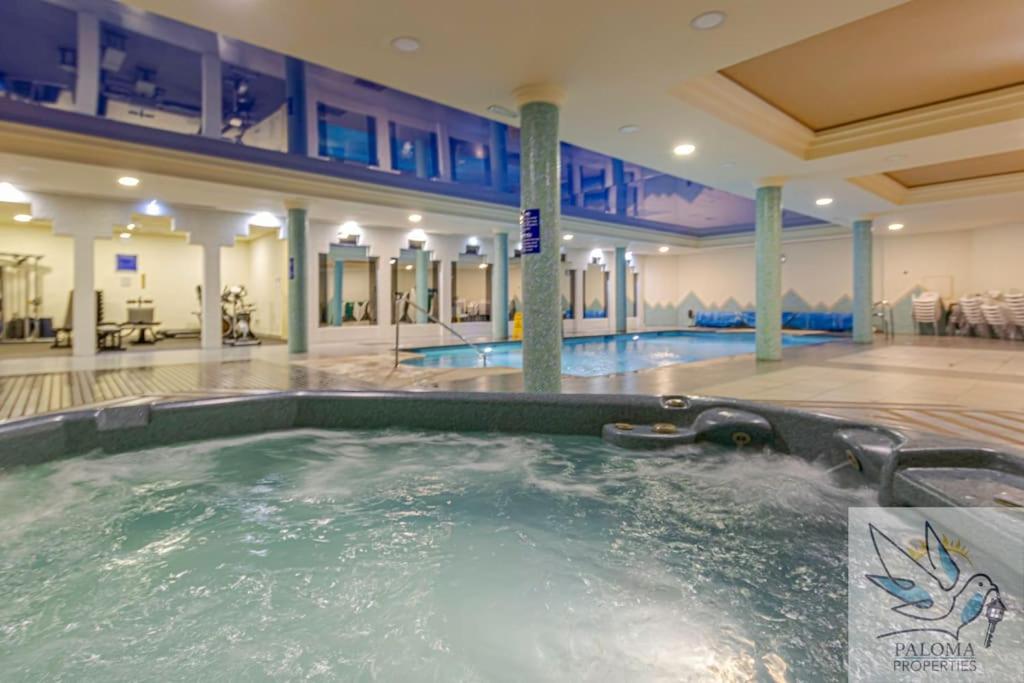 2 BDR apt with heated pool & jacuzzi