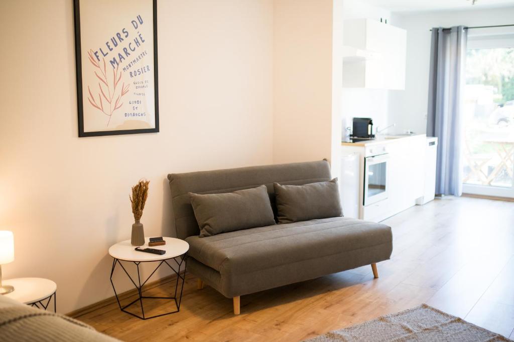 Posezení v ubytování HUGOS Studio Apartment
