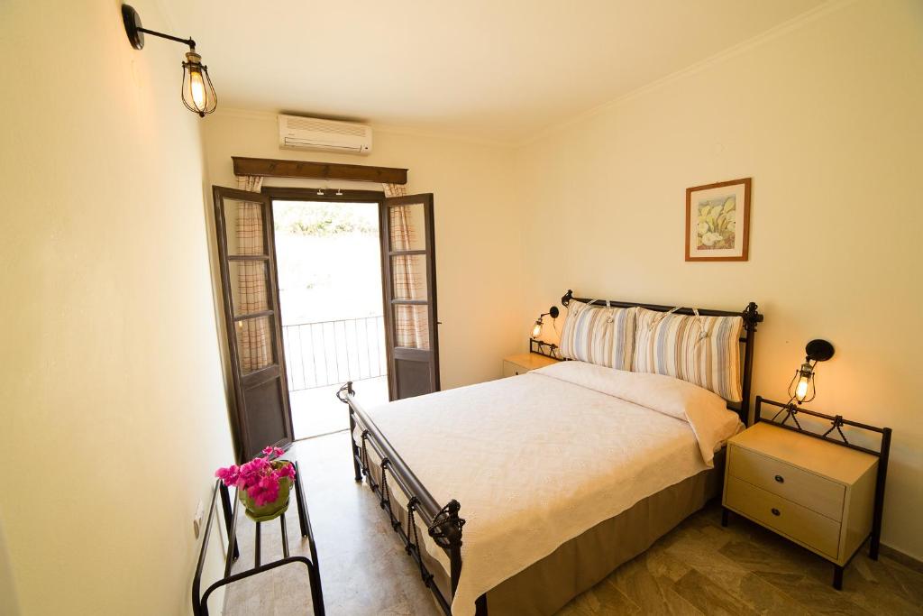 Postel nebo postele na pokoji v ubytování Hotel Porto Potha
