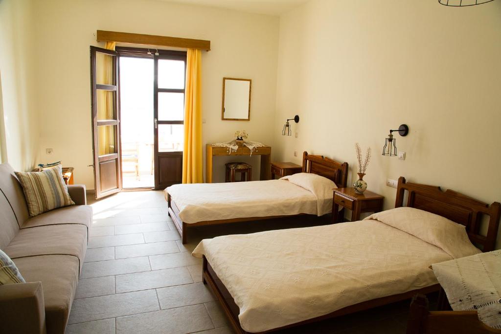 Postel nebo postele na pokoji v ubytování Hotel Porto Potha