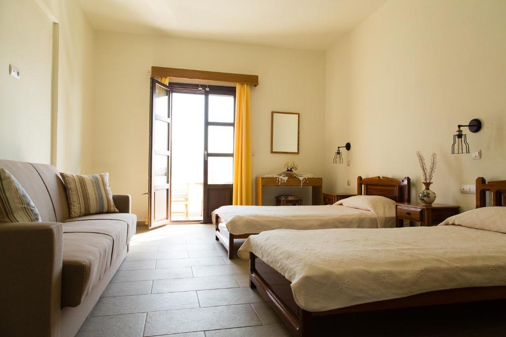 Postel nebo postele na pokoji v ubytování Hotel Porto Potha