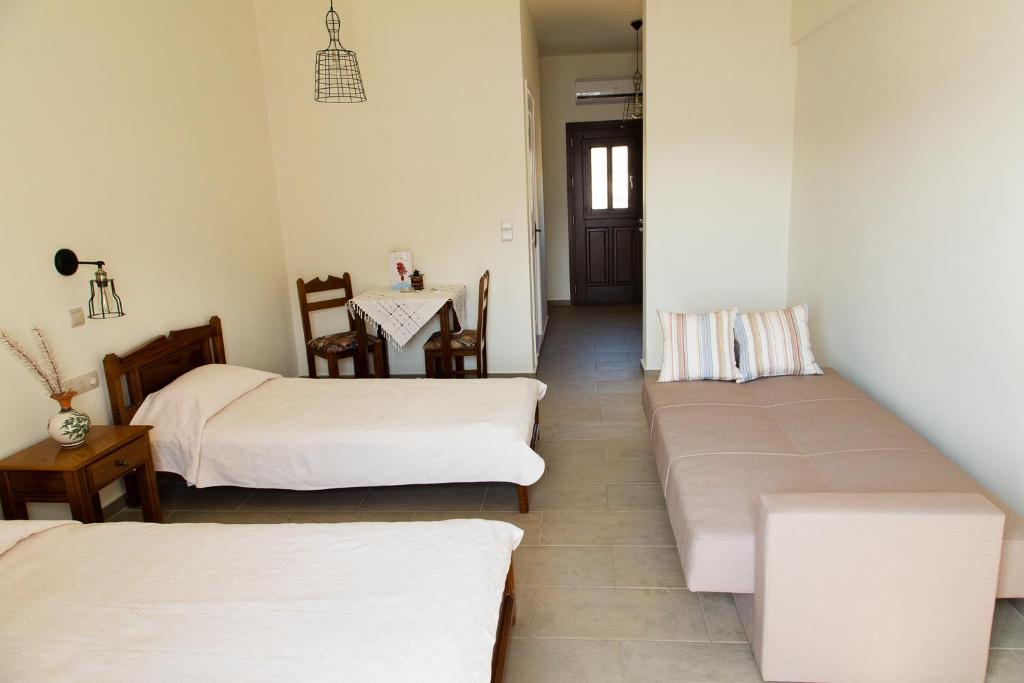 Postel nebo postele na pokoji v ubytování Hotel Porto Potha