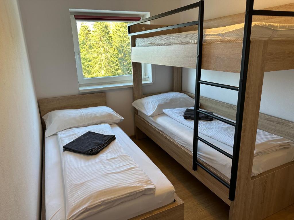 Postel nebo postele na pokoji v ubytování Apartman 37 Vysoke Tatry