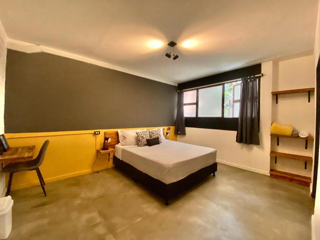 Postel nebo postele na pokoji v ubytování Casa Mosaiko Primer Parque Laureles