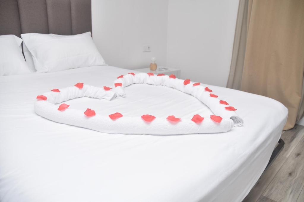 Postel nebo postele na pokoji v ubytování Hotel Cantinho