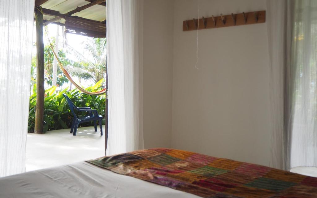 Postel nebo postele na pokoji v ubytování Namaste cabaña 02