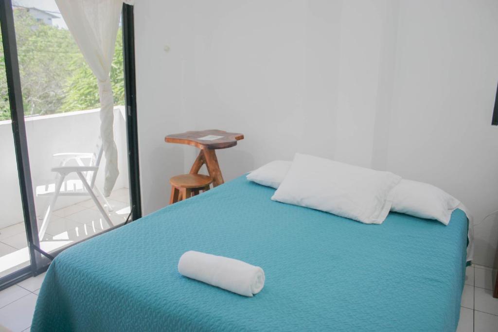 Postel nebo postele na pokoji v ubytování Casa de Nelly
