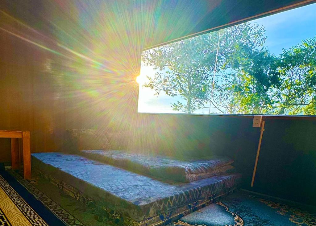 Postel nebo postele na pokoji v ubytování Tà Xùa Casablanca Homestay