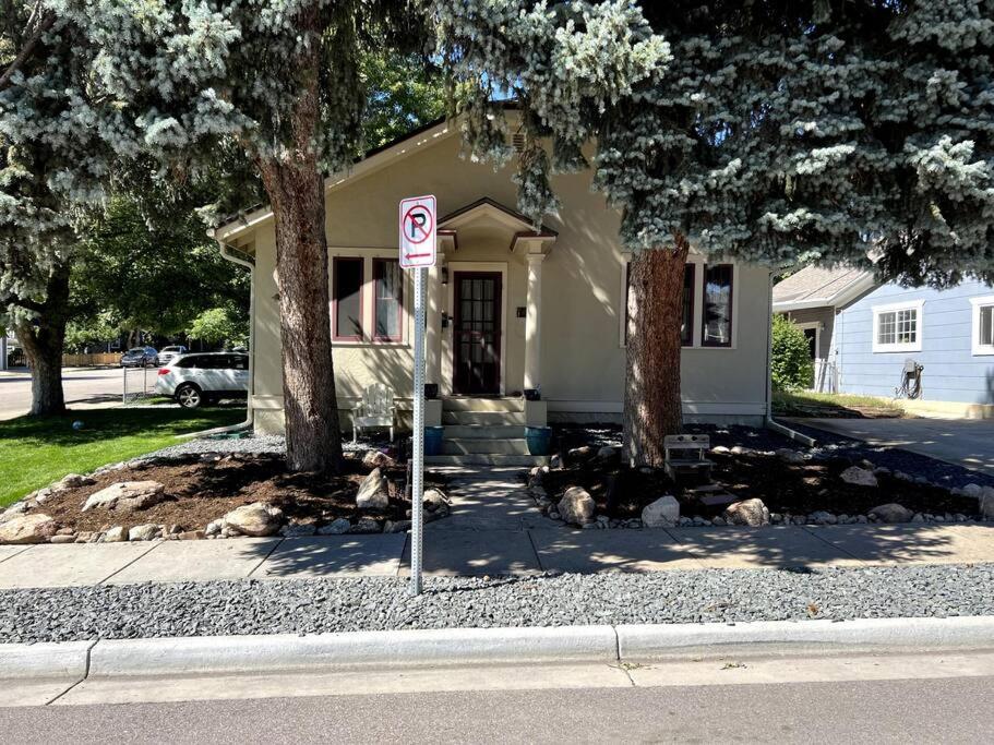 a no parking sign in front of a house at Walk to Dining Breweries and Shops Plus New Hot Tub in Louisville