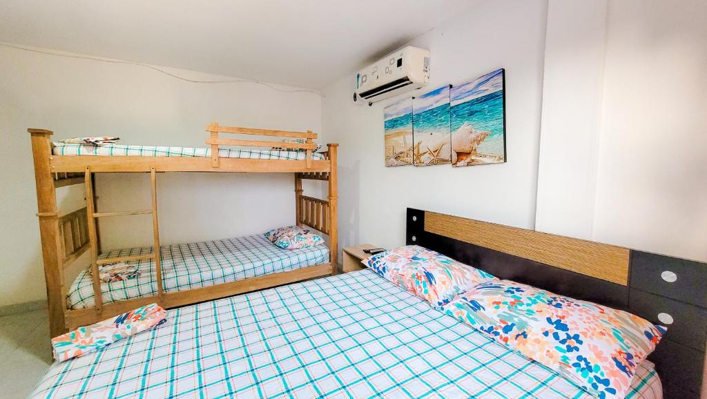 Postel nebo postele na pokoji v ubytování Casa Hotel Isabella