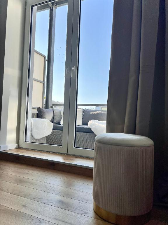 Ein Sitzbereich in der Unterkunft ZUHAUSE AM MEER mit Sonnenbalkon in Strand- und Altstadtnähe