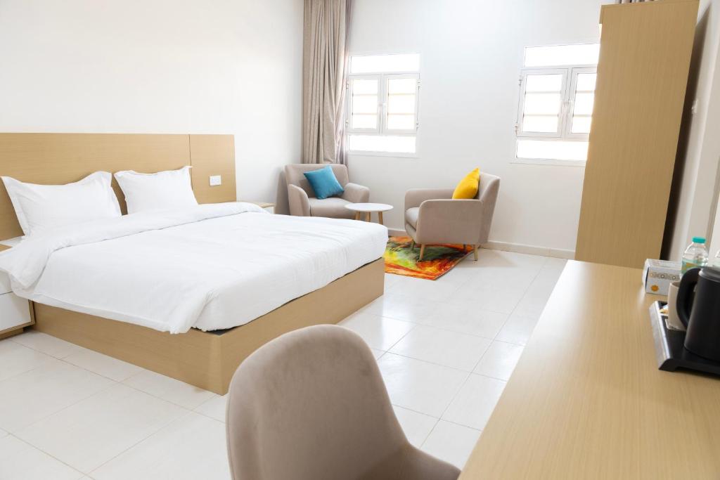 Postel nebo postele na pokoji v ubytování Riviera suites , hotel apartement