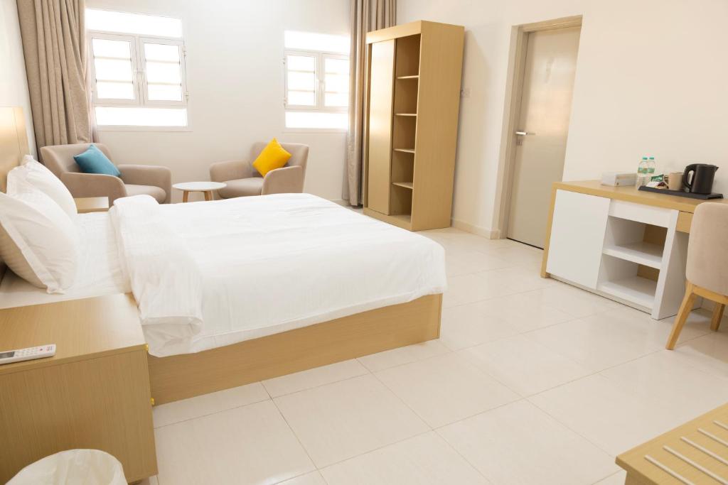 Postel nebo postele na pokoji v ubytování Riviera suites , hotel apartement