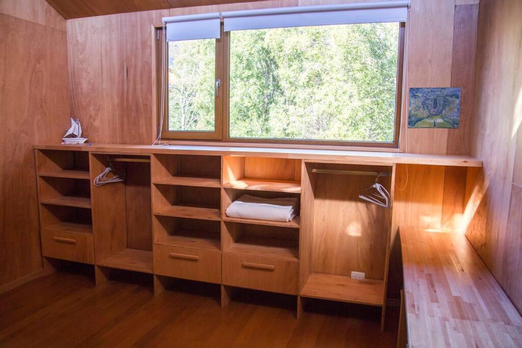 Postel nebo postele na pokoji v ubytování Casa moderna en el bosque