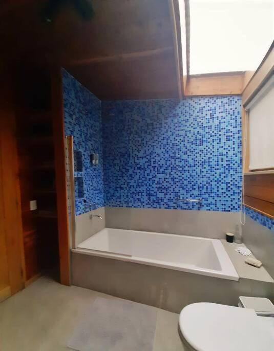 Koupelna v ubytování Casa moderna en el bosque