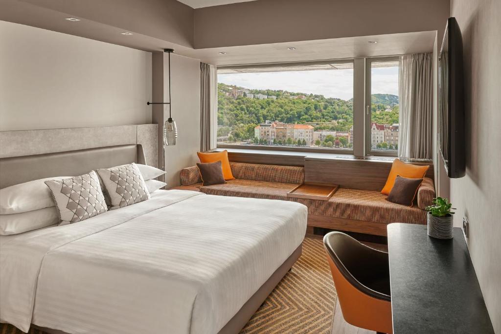 Postel nebo postele na pokoji v ubytování Budapest Marriott Hotel