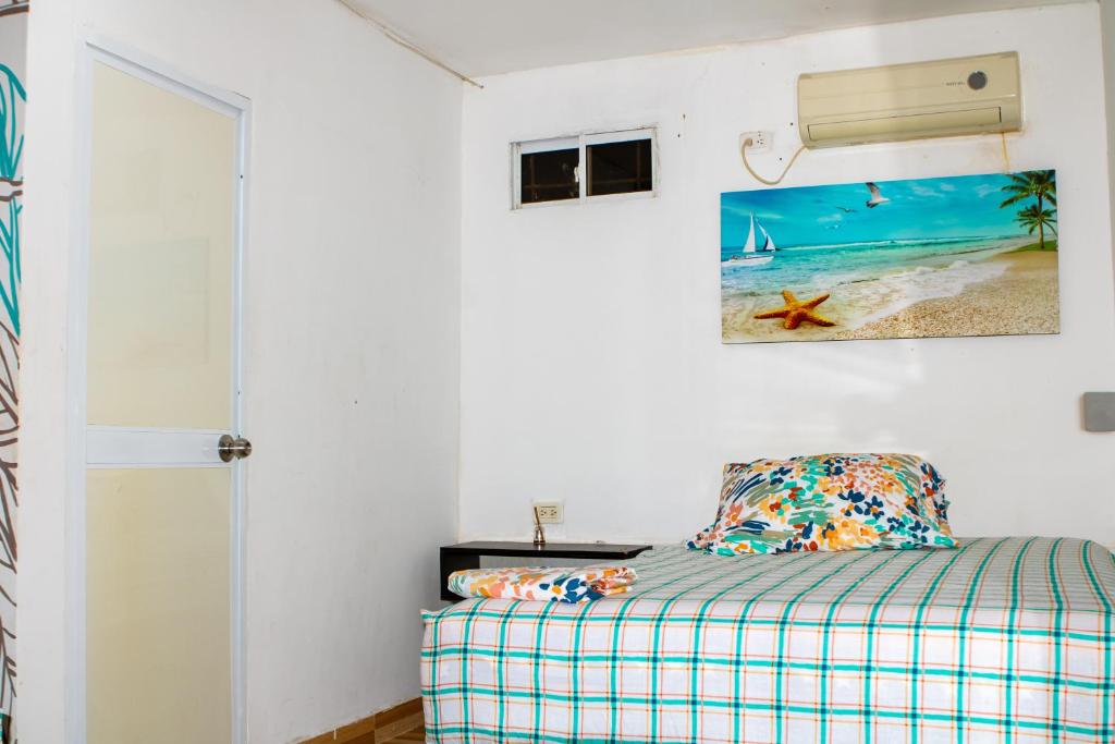 Postel nebo postele na pokoji v ubytování Casa Hotel Isabella