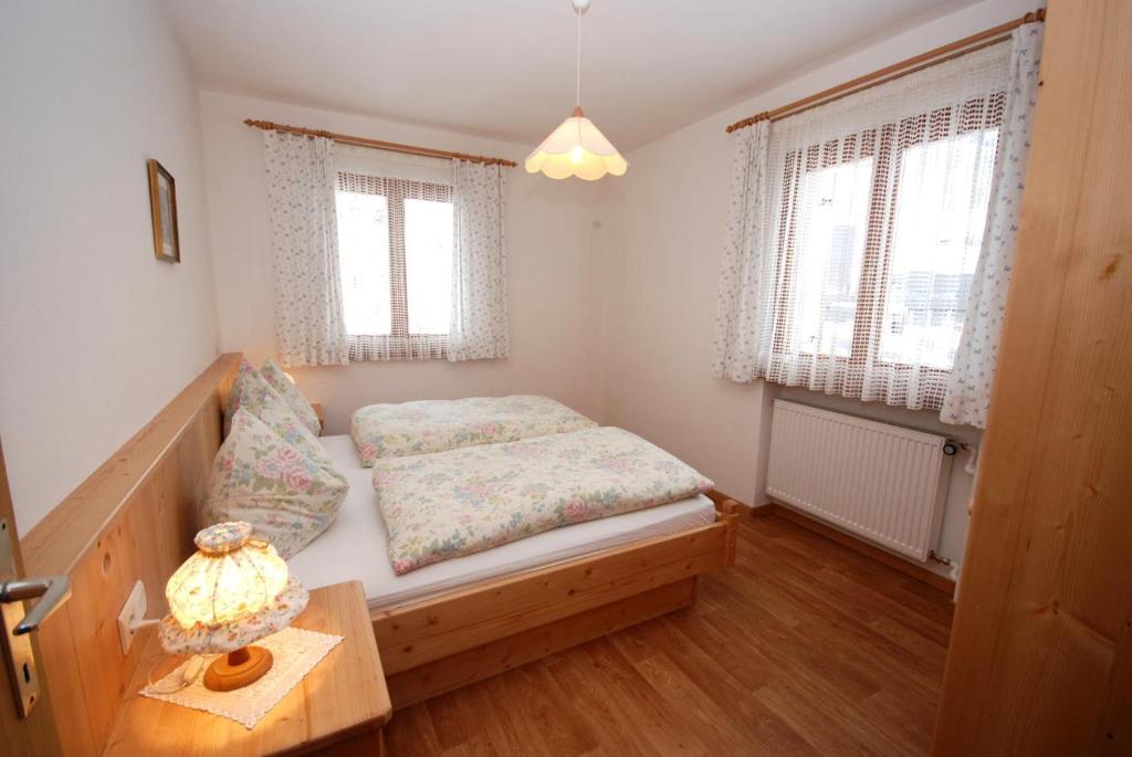 Postel nebo postele na pokoji v ubytování Appartments Oberhofer