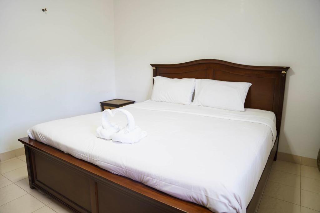 Postel nebo postele na pokoji v ubytování Two Fifty Nine Resort 259 Resort