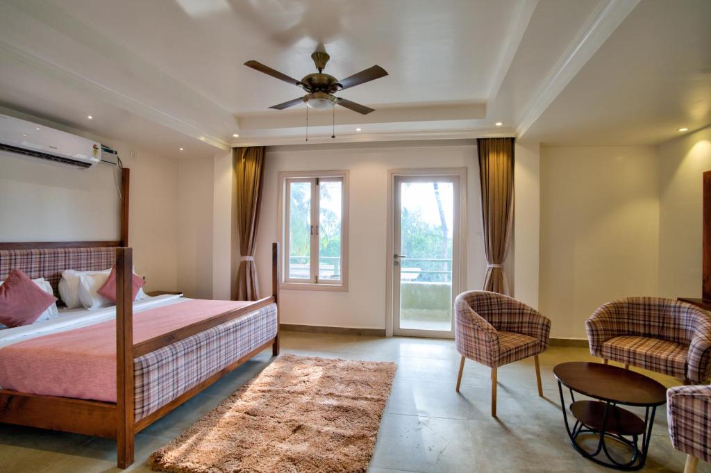 Postel nebo postele na pokoji v ubytování Hotel Sea Castle