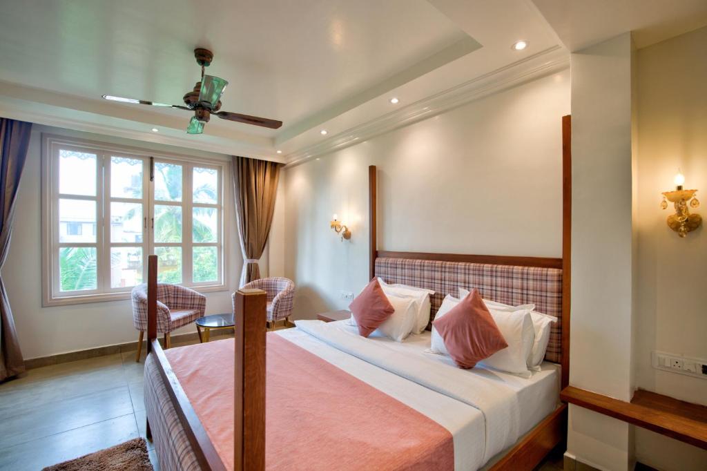 Postel nebo postele na pokoji v ubytování Hotel Sea Castle