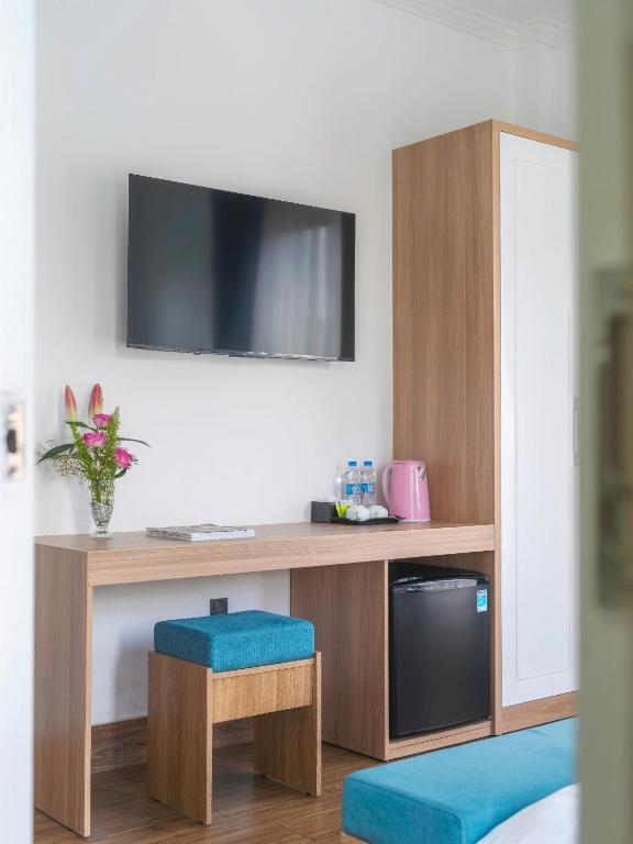 TV a/nebo společenská místnost v ubytování VMT Hotel Da Lat