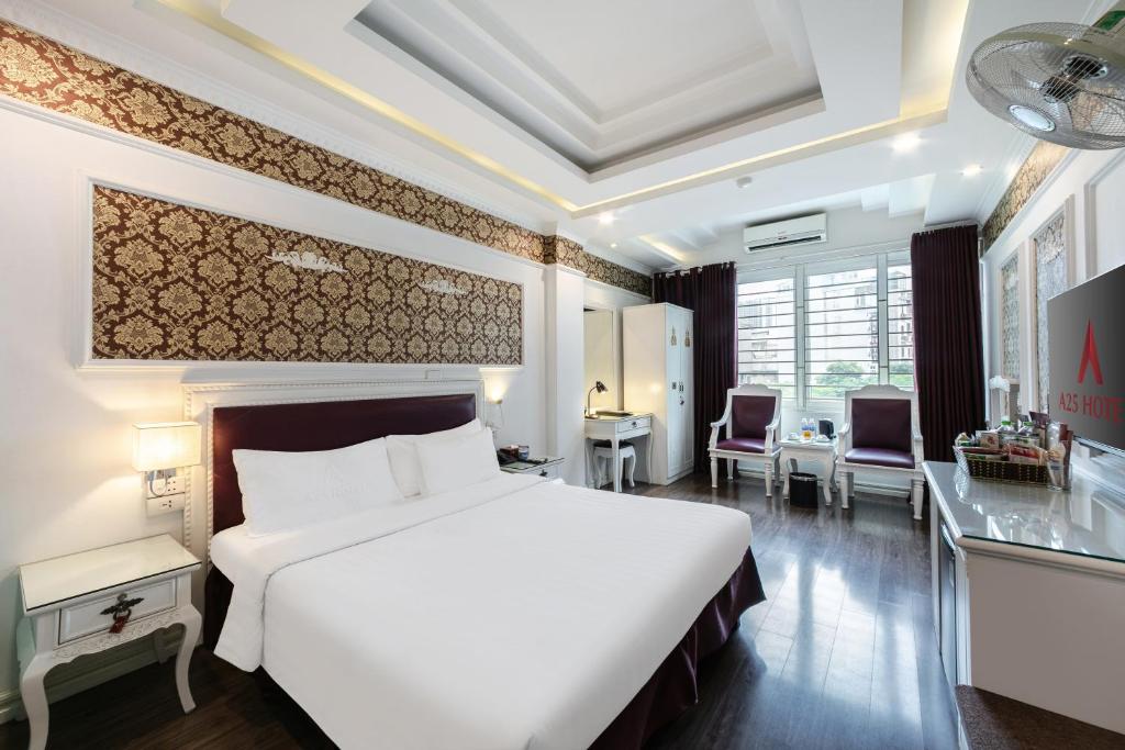 Postel nebo postele na pokoji v ubytování A25 Hotel - Dịch Vọng Hậu