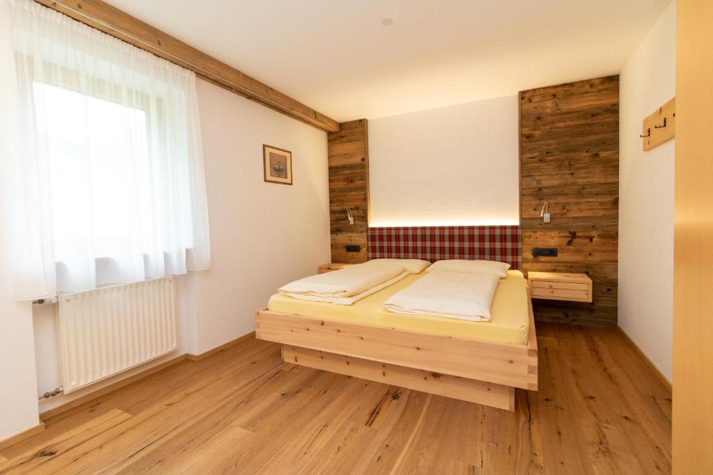 Postel nebo postele na pokoji v ubytování Sennerhof