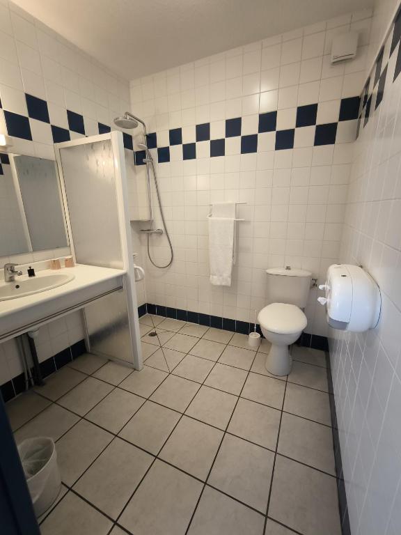 Koupelna v ubytování Hôtel Le Laury's