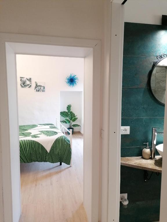 Postel nebo postele na pokoji v ubytování Camera Botanica