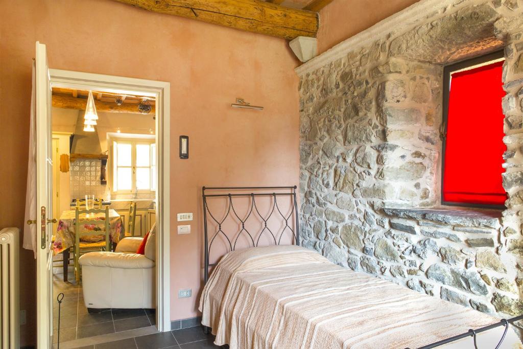 Postel nebo postele na pokoji v ubytování Agriturismo Pratofranco