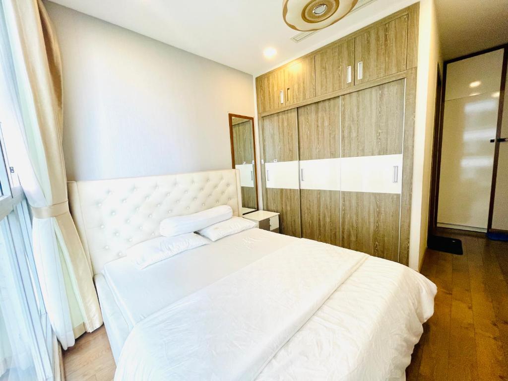 Postel nebo postele na pokoji v ubytování Hana homestay- 1 Phòng ngủ trong căn hộ chủ nhà đang ở tại Park 4-Vinhome Central Park Tân cảng Bình Thạnh HCM- sát landmark 81