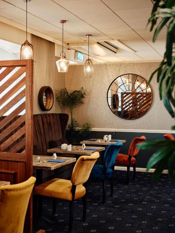 Posezení v ubytování Hotel De Normandie